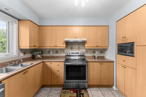 Kitchen - 692 Rue Forand, Repentigny (Le Gardeur), QC - Indoor Photo Showing Kitchen With Double Sink