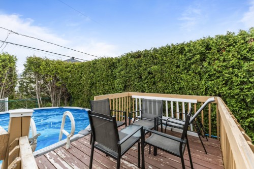 Exterior - 692 Rue Forand, Repentigny (Le Gardeur), QC - Outdoor With Above Ground Pool With Deck Patio Veranda