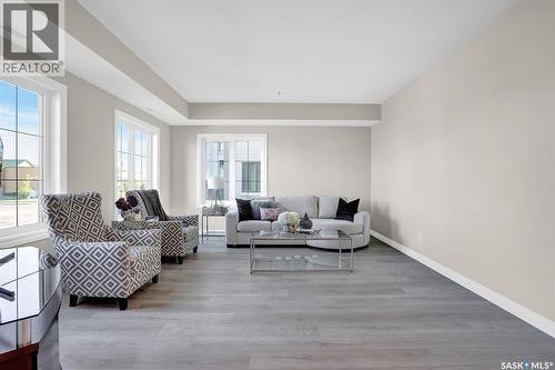 401 4594 Harbour Landing Drive, Regina, SK - Indoor Photo Showing Living Room