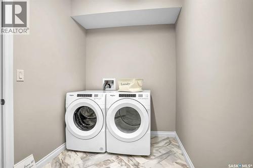 401 4594 Harbour Landing Drive, Regina, SK - Indoor Photo Showing Laundry Room