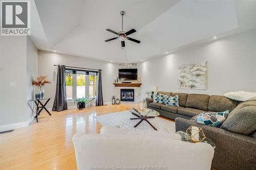 7840 Stella Crescent, Windsor, ON - Indoor Photo Showing Living Room With Fireplace