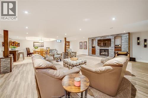7840 Stella Crescent, Windsor, ON - Indoor Photo Showing Living Room With Fireplace