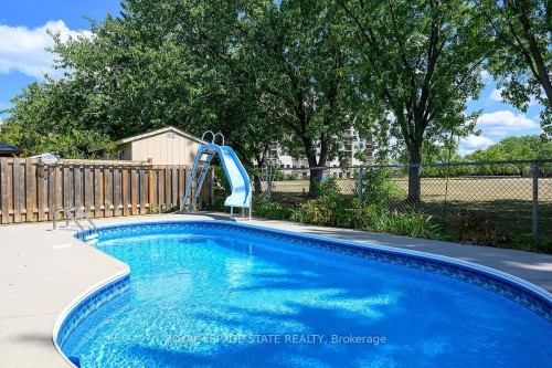 24 Oxford Street, Brantford, ON - Outdoor With In Ground Pool