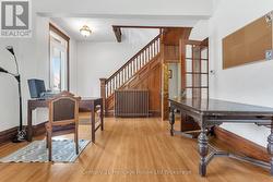 Front room/receiving room currently used as office - 