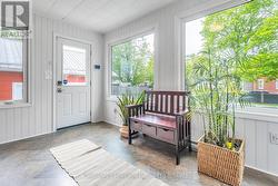 Sun room/mud room with new windows & doors - 