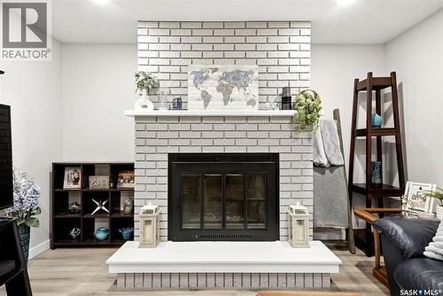 68 Carmichael Road, Regina, SK - Indoor Photo Showing Living Room With Fireplace