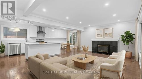 1808 Gilbert Avenue, Ottawa, ON - Indoor Photo Showing Living Room With Fireplace