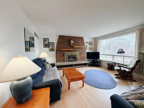 714 River Drive, Kenora, ON - Indoor Photo Showing Living Room With Fireplace