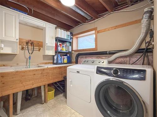 49084 Service Road, Brandon, MB - Indoor Photo Showing Laundry Room