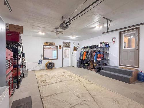 49084 Service Road, Brandon, MB - Indoor Photo Showing Garage