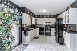 Kitchen with walkout to rear patio - 