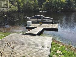 Dock and boatlift at river - 