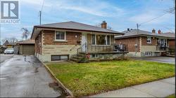 MAIN - 203 CROMWELL AVENUE  Oshawa, ON L1J 4T7