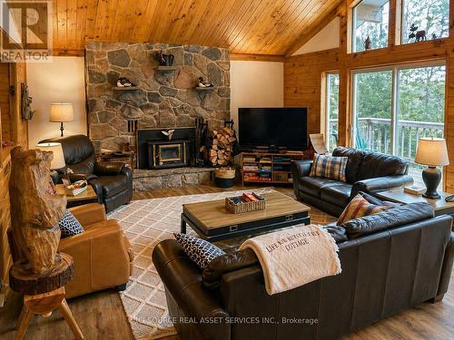 369 Loon Lake Road, Kearney, ON - Indoor Photo Showing Living Room With Fireplace