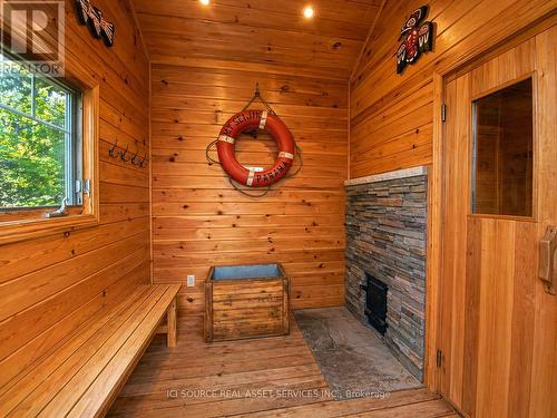 369 Loon Lake Road, Kearney, ON - Indoor Photo Showing Other Room With Fireplace