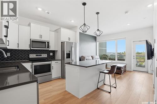 309 105 Willis Crescent, Saskatoon, SK - Indoor Photo Showing Kitchen With Upgraded Kitchen