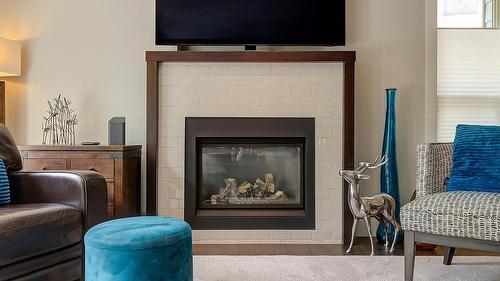 1-1865 Begbie Road, Kelowna, BC - Indoor Photo Showing Living Room With Fireplace