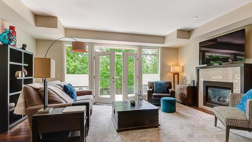 1-1865 Begbie Road, Kelowna, BC - Indoor Photo Showing Living Room With Fireplace