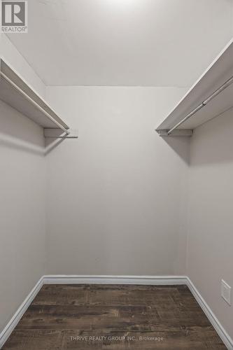 Bedroom has large walk in closet - 2 - 329 Thompson Road, London South (South I), ON - Indoor With Storage
