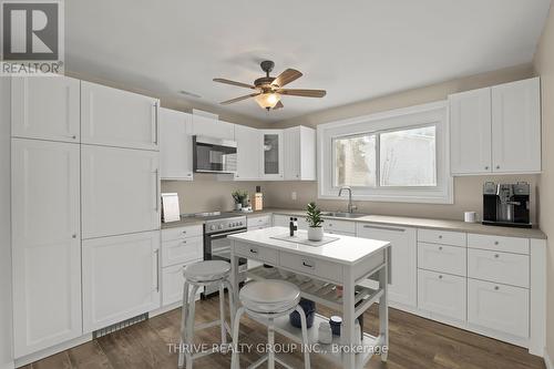 This photo has been virtually staged - 2 - 329 Thompson Road, London South (South I), ON - Indoor Photo Showing Kitchen