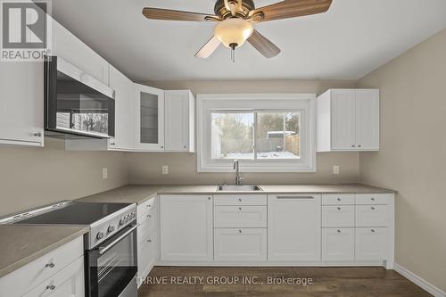 Large southern window overlooks private back yard. - 2 - 329 Thompson Road, London South (South I), ON - Indoor Photo Showing Kitchen