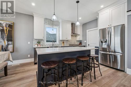 50 Faith Drive, Mapleton, ON - Indoor Photo Showing Kitchen With Upgraded Kitchen