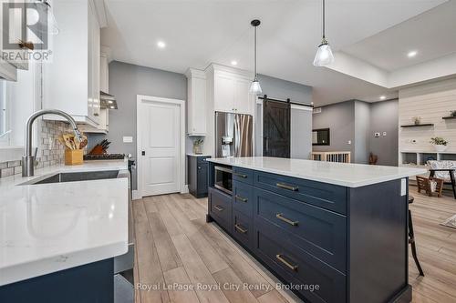 50 Faith Drive, Mapleton, ON - Indoor Photo Showing Kitchen With Upgraded Kitchen