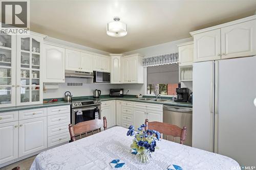 35 Harrison Crescent, Saskatoon, SK - Indoor Photo Showing Kitchen With Double Sink