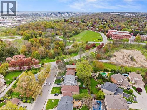 Aerial perspective showcasing residential properties and extensive green spaces - 3 San Pedro Drive, Hamilton, ON - Outdoor With View