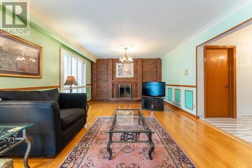 1400 Bough Beeches Boulevard, Mississauga, ON - Indoor Photo Showing Living Room With Fireplace