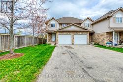 2 Cars driveway in front of Garage - 