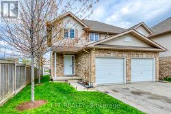 Attached Garage with entry inside home - 