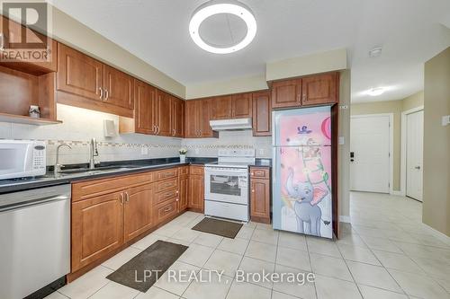 6 - 10 Fallowfield Drive, Kitchener, ON - Indoor Photo Showing Kitchen With Double Sink