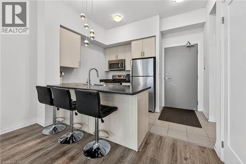 10 Concord Place Unit# 516, Grimsby, ON - Indoor Photo Showing Kitchen With Stainless Steel Kitchen With Upgraded Kitchen