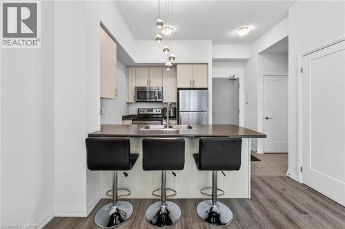 10 Concord Place Unit# 516, Grimsby, ON - Indoor Photo Showing Kitchen With Stainless Steel Kitchen With Upgraded Kitchen