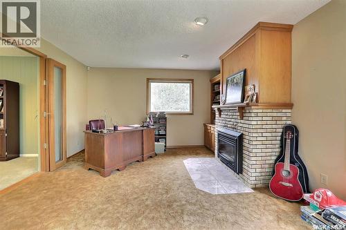 15 Academy Park Road, Regina, SK - Indoor With Fireplace