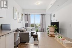 Bright Living Room w/Walkout to a Private Balcony - 