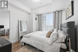 The Spacious Bedroom Offers a Walk-In Closet - 