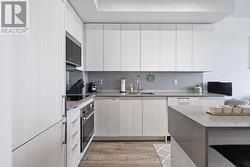 Upgraded Gourmet Kitchen w/Integrated Appliances - 