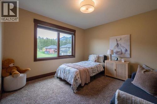 upstairs bedroom 1 - 30 Silver Ridge Drive, Fernie, BC - Indoor Photo Showing Bedroom