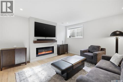 6 515 Delainey Road, Saskatoon, SK - Indoor Photo Showing Living Room With Fireplace