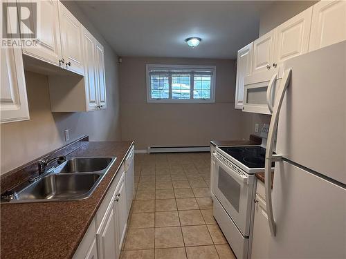 189 First Avenue Unit# 7B, Sudbury, ON - Indoor Photo Showing Kitchen With Double Sink