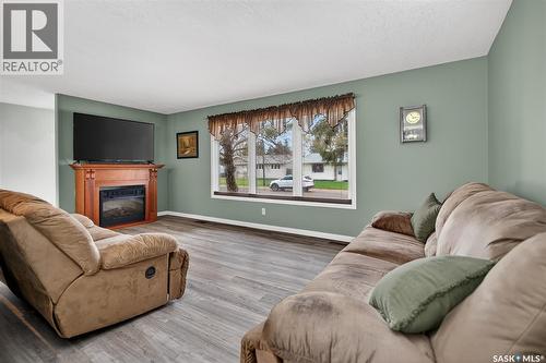 1227 Pascoe Drive E, Moose Jaw, SK - Indoor Photo Showing Living Room With Fireplace