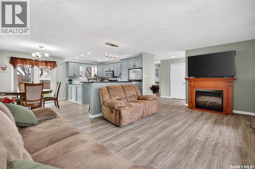 1227 Pascoe Drive E, Moose Jaw, SK - Indoor Photo Showing Living Room With Fireplace