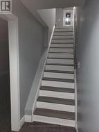 Stairwell to Upper Level - 