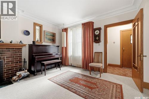 203 Angus Crescent, Regina, SK - Indoor With Fireplace