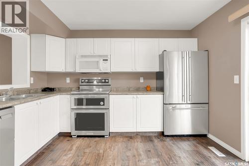 102 670 Kenderdine Road, Saskatoon, SK - Indoor Photo Showing Kitchen With Double Sink
