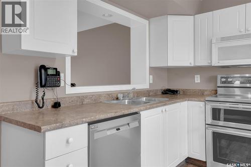 102 670 Kenderdine Road, Saskatoon, SK - Indoor Photo Showing Kitchen With Double Sink