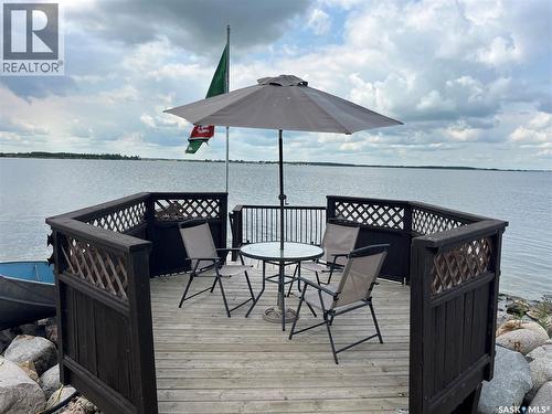 104 Heistad Place, Fishing Lake, SK - Outdoor With Body Of Water With Deck Patio Veranda With Exterior