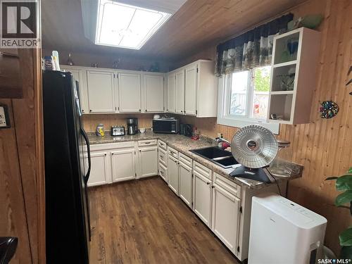 104 Heistad Place, Fishing Lake, SK - Indoor Photo Showing Kitchen With Double Sink